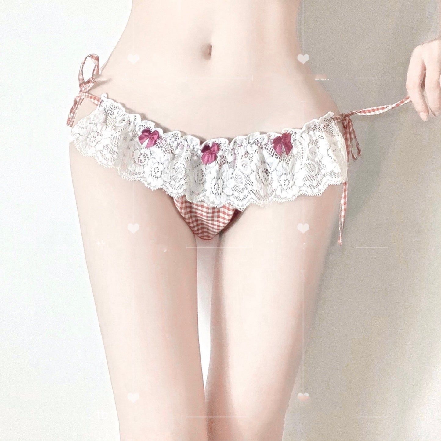 Low-waisted lace and silk lingerie briefs